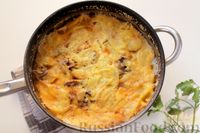 Фото приготовления рецепта: Картофельная запеканка с грибами в сливочном соусе - шаг №19