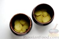 Фото приготовления рецепта: Картофель, запечённый с килькой в томате - шаг №8