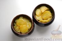 Фото приготовления рецепта: Картофель, запечённый с килькой в томате - шаг №11