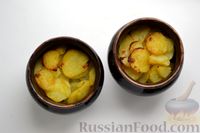 Фото приготовления рецепта: Картофель, запечённый с килькой в томате - шаг №12