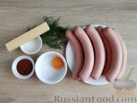 Фото приготовления рецепта: Сосиски в тесте по-новому, с кетчупом и сыром - шаг №2