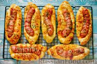 Фото приготовления рецепта: Сосиски в тесте по-новому, с кетчупом и сыром - шаг №24