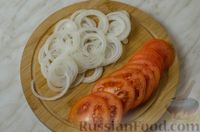 Фото приготовления рецепта: Рыба, запечённая с цветной капустой, сыром и помидором - шаг №4