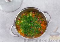 Фото приготовления рецепта: Густой суп с овощами и колбасками - шаг №10