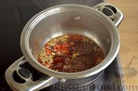 Фото приготовления рецепта: Свиные рёбра, запечённые в остром томатно-соевом маринаде - шаг №10