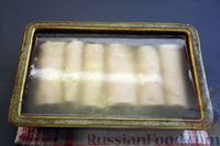 Фото приготовления рецепта: Заливные рулетики из ветчины с грибами и варёными яйцами - шаг №19