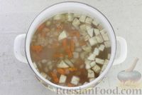 Фото приготовления рецепта: Суп со щавелем и овощами на рыбном бульоне - шаг №8