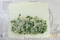 Фото приготовления рецепта: Кулебяка из слоёного теста, с рыбой, рисом и яйцами - шаг №9