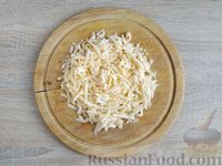 Фото приготовления рецепта: "Гнёзда" из мясного фарша с начинкой из грибов и сыра (в духовке) - шаг №11