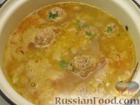 Фото приготовления рецепта: Овощной суп с рисовыми фрикадельками - шаг №11