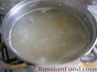 Фото приготовления рецепта: Суп с фрикадельками, овощами и пшеном - шаг №8