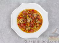 Фото приготовления рецепта: Суп с грибами, сладким перцем, кукурузой и копчёными колбасками - шаг №11