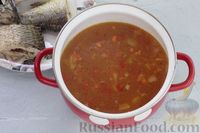 Фото приготовления рецепта: Томатный суп с рыбой и зелёным горошком - шаг №10
