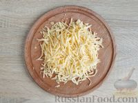 Фото приготовления рецепта: Запеканка из спагетти с помидорами, колбасой, сыром и томатным соусом - шаг №12