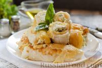 Фото к рецепту: Рулетики из кальмаров, жаренных в кляре, с начинкой из творожного сыра