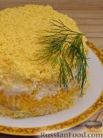 Фото к рецепту: Слоеный салат "Мимоза" с рисом