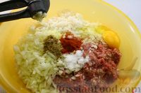 Фото приготовления рецепта: Тефтели, запечённые в томатно-сливочном соусе - шаг №13