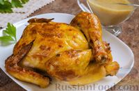 Фото к рецепту: Запечённая курица, тушенная в вине, со сливочно-коньячным соусом