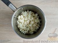 Фото приготовления рецепта: Кабачки, тушенные с цветной капустой в сметанно-томатном соусе - шаг №4