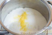 Фото приготовления рецепта: Малина, перетёртая с лимоном и сахаром (на зиму) - шаг №3