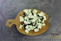 Фото приготовления рецепта: Салат из баклажанов с огурцами и перцем, в томатном соусе (на зиму) - шаг №8
