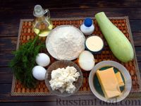 Фото приготовления рецепта: Кабачковые блины с начинкой из творога, сыра и зелени - шаг №1