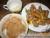 Фото приготовления рецепта: Овсяная каша с кабачком, изюмом и орехами (в духовке) - шаг №10
