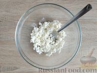 Фото приготовления рецепта: Баклажаны, запечённые с сыром фета и яйцами - шаг №7