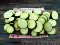 Фото приготовления рецепта: Баклажаны в томатно-чесночном соусе (на зиму) - шаг №5