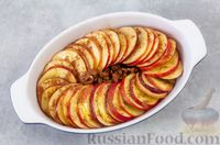 Фото приготовления рецепта: Яблоки, запечённые с орехами, корицей, изюмом и мёдом - шаг №5
