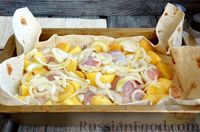 Фото приготовления рецепта: Куриные голени, запечённые с картофелем, в лаваше - шаг №6