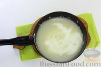 Фото приготовления рецепта: Цветная капуста, запечённая в кефирном соусе с чесноком - шаг №8