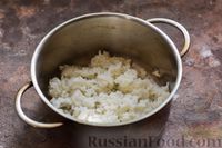 Фото приготовления рецепта: Яйца, фаршированные рисом и зеленью - шаг №2