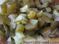 Фото приготовления рецепта: Солянка с капустой, грибами и консервированной рыбой - шаг №7