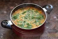 Фото приготовления рецепта: Суп с килькой в томатном соусе, пшеном и яйцами - шаг №13