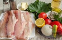 Фото приготовления рецепта: Рыба, запечённая с овощами в виноградных листьях - шаг №1