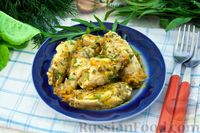 Фото приготовления рецепта: Куриные крылышки, тушенные в сметанно-чесночном соусе - шаг №16