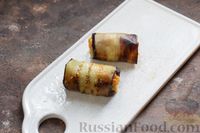 Фото приготовления рецепта: Рулетики из баклажанов, фаршированные рисом и овощами (в духовке) - шаг №12