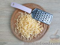 Фото приготовления рецепта: Капустная запеканка с сыром (на сковороде) - шаг №7