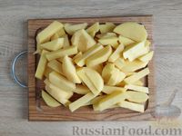 Фото приготовления рецепта: Картошка, тушенная с куриными сердечками и капустой - шаг №12