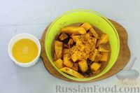 Фото приготовления рецепта: Тыква, запечённая с орехами, изюмом, апельсином и пряностями - шаг №6
