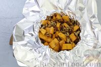 Фото приготовления рецепта: Тыква, запечённая с орехами, изюмом, апельсином и пряностями - шаг №7
