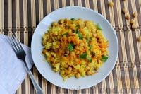 Фото приготовления рецепта: Рис с нутом и морковью - шаг №11