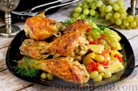 Фото к рецепту: Курица, запечённая в духовке с овощами и виноградом