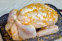 Фото приготовления рецепта: Утка, фаршированная апельсинами, в духовке - шаг №8