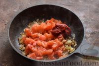 Фото приготовления рецепта: Рыбные тефтели, тушенные в томатном соусе - шаг №9