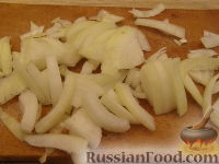 Фото приготовления рецепта: Кальмары, тушенные в сметане - шаг №3