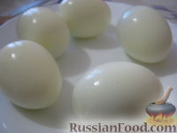 Фото приготовления рецепта: Яйца, фаршированные печенью трески - шаг №3