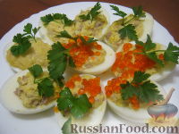 Фото приготовления рецепта: Яйца, фаршированные печенью трески - шаг №12