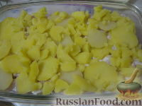 Фото приготовления рецепта: Запеканка из картофеля с рыбой - шаг №11
